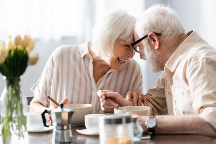 Selective focus of positive senor couple